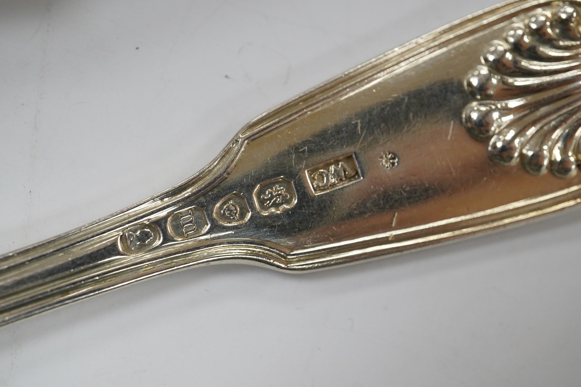 A set of six George IV silver fiddle, thread and shell pattern dessert forks and six matching spoons, William Chawner, London, 1827, 22.4oz. Condition - poor to fair